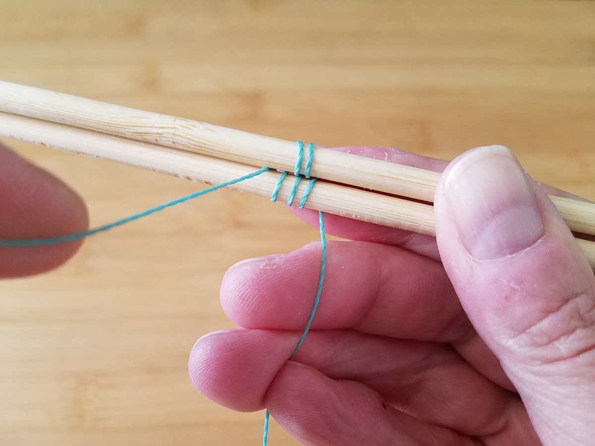 Here I've begun the third pattern repeat by completing a third wrap around Wire 1.