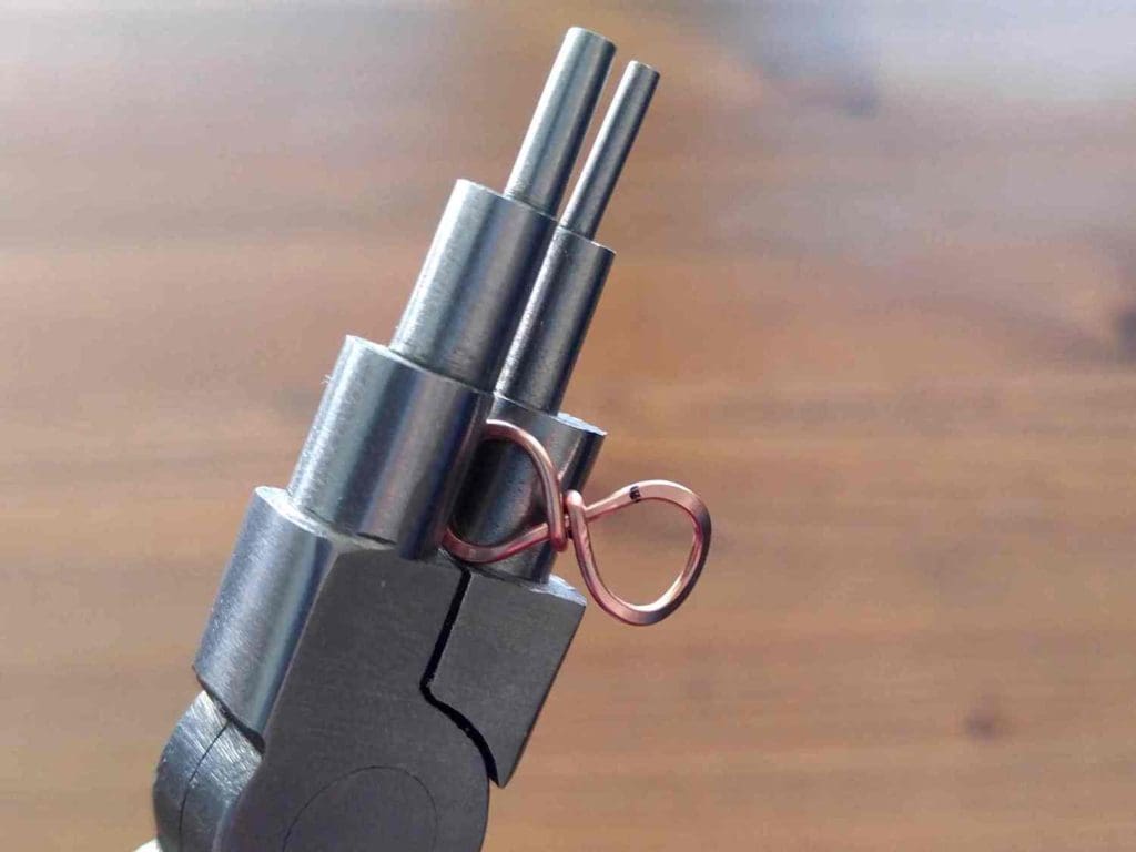 Step 7 - Use your bail-making pliers to softly curve the ends of the loops, as shown. 
