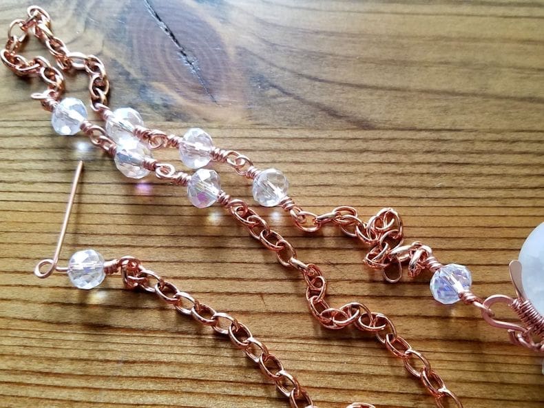 Chain Step 7 - Add a third section of chain to your three beaded connectors and finish with a single beaded connector at the other end of the chain, as shown.