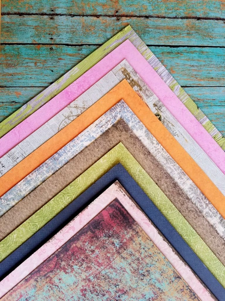 Make these colorful, versatile, and reusable DIY Photography Backgrounds in minutes and for less than $1.00 each.