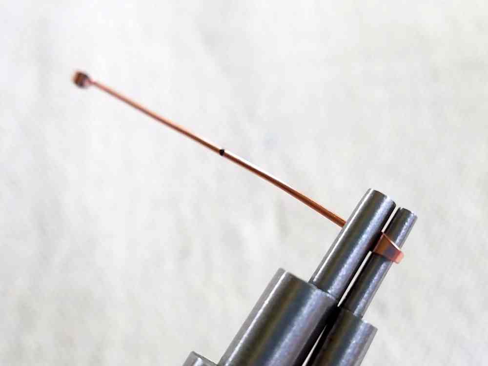 Delicate Bar Pendant, Step 3: begin shaping Wire 1 using stepped bail-making pliers