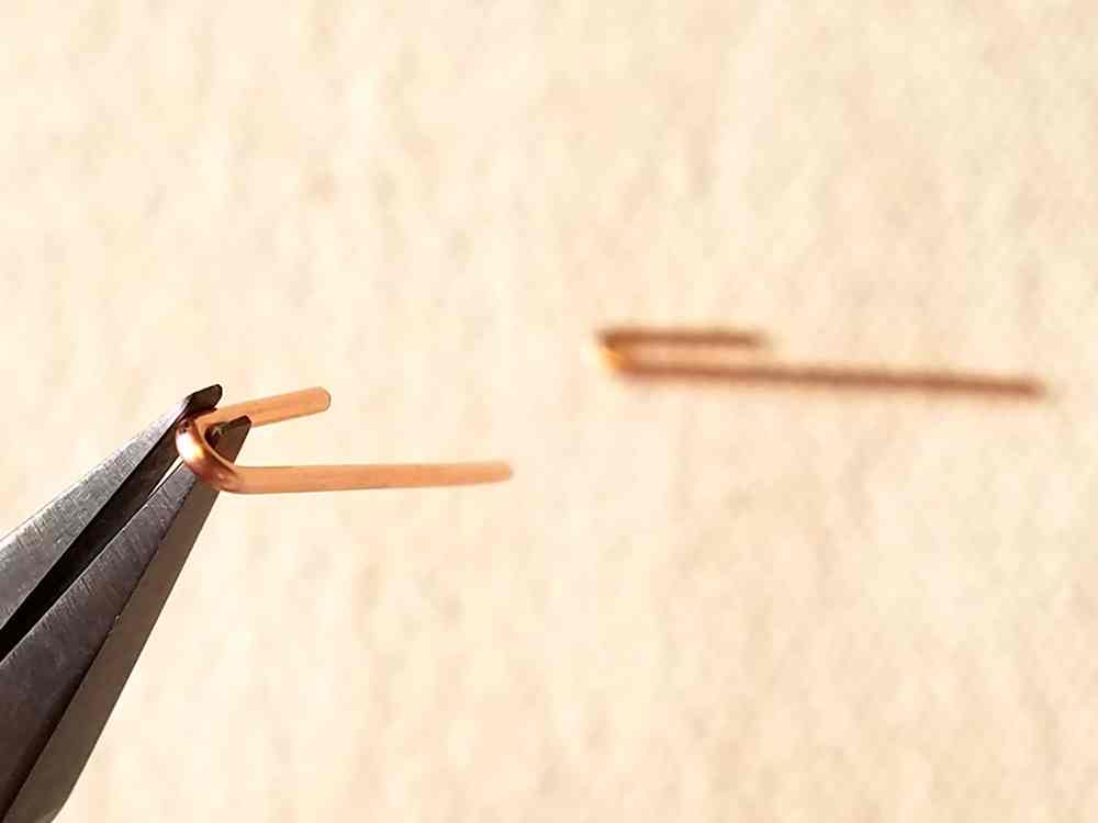 Form the hinge pins with flat nose pliers.