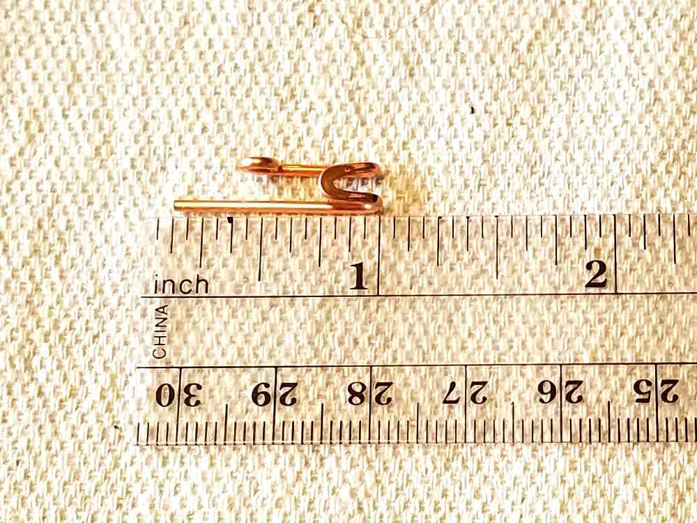 Trim the hook to length and form small, tight loops on the ends of the arms using the 2mm step of stepped bail-making pliers.