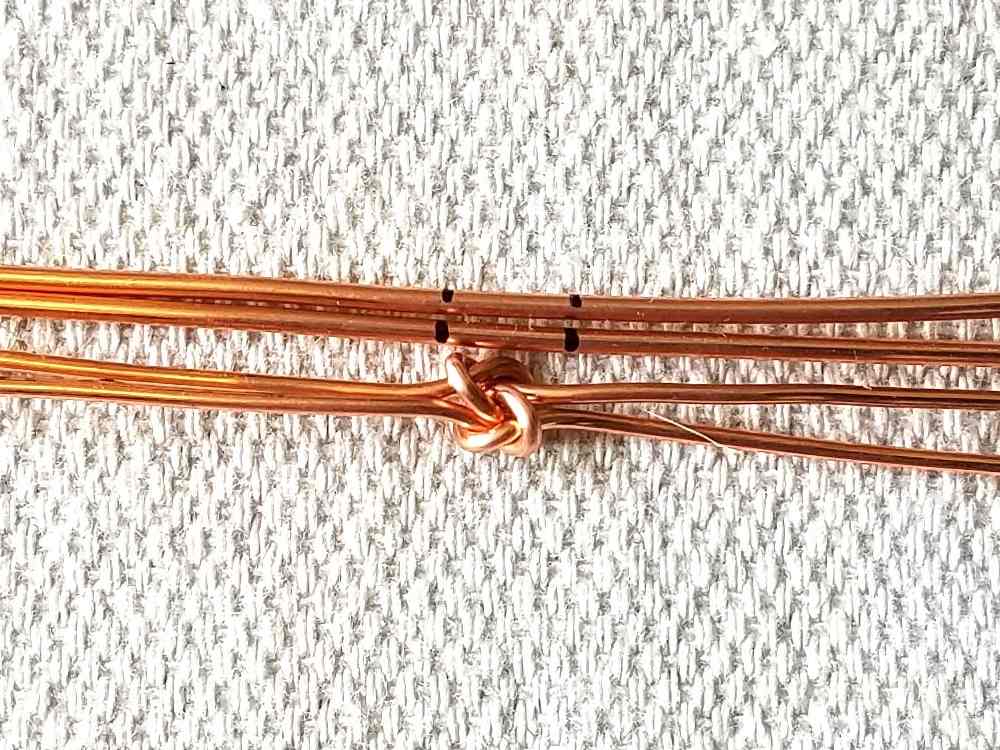 Step 10 - Mark the position of the knot on your two 16ga core wires.