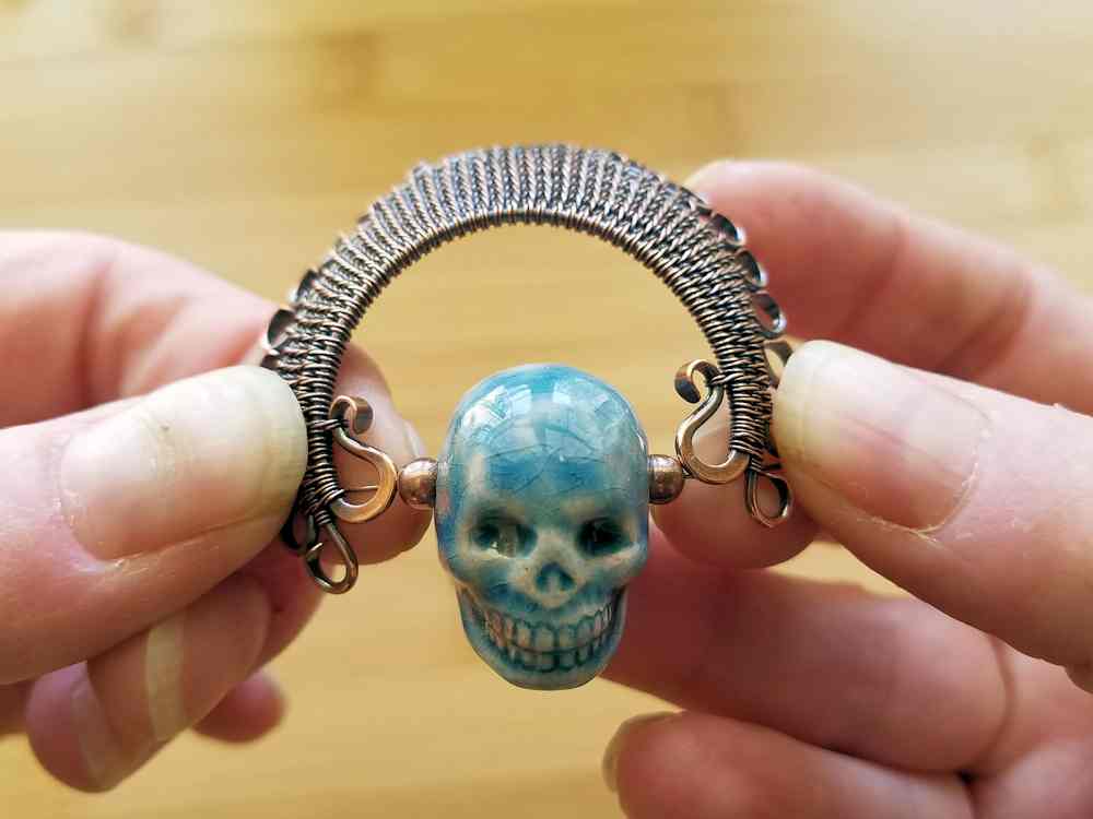 Door 44 Studios Ancestor Pendant Tutorial: Step 24, test fit the focal bead and spacer beads. Adjust the headdress, if necessary