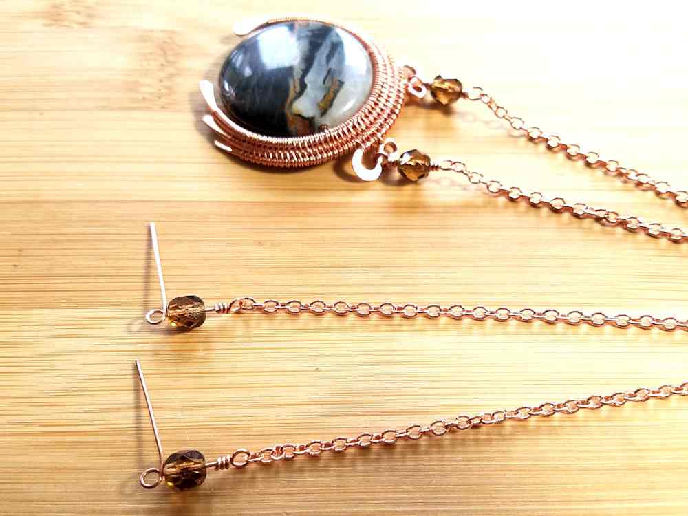 Step 26 - Use the last two pieces of wire that you cut in Step 23 to attach wrapped loops to the unfinished ends of the chain. 