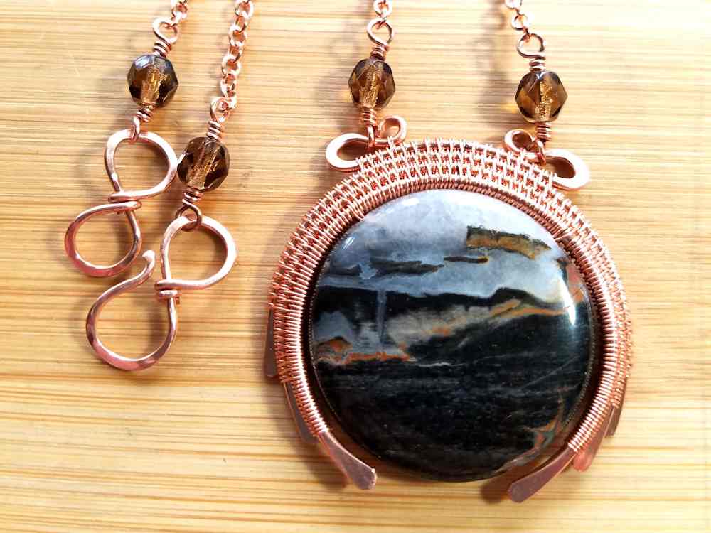 Step 27 - Make an Easy Infinity Clasp and attach one half of the clasp to each segment of chain. 