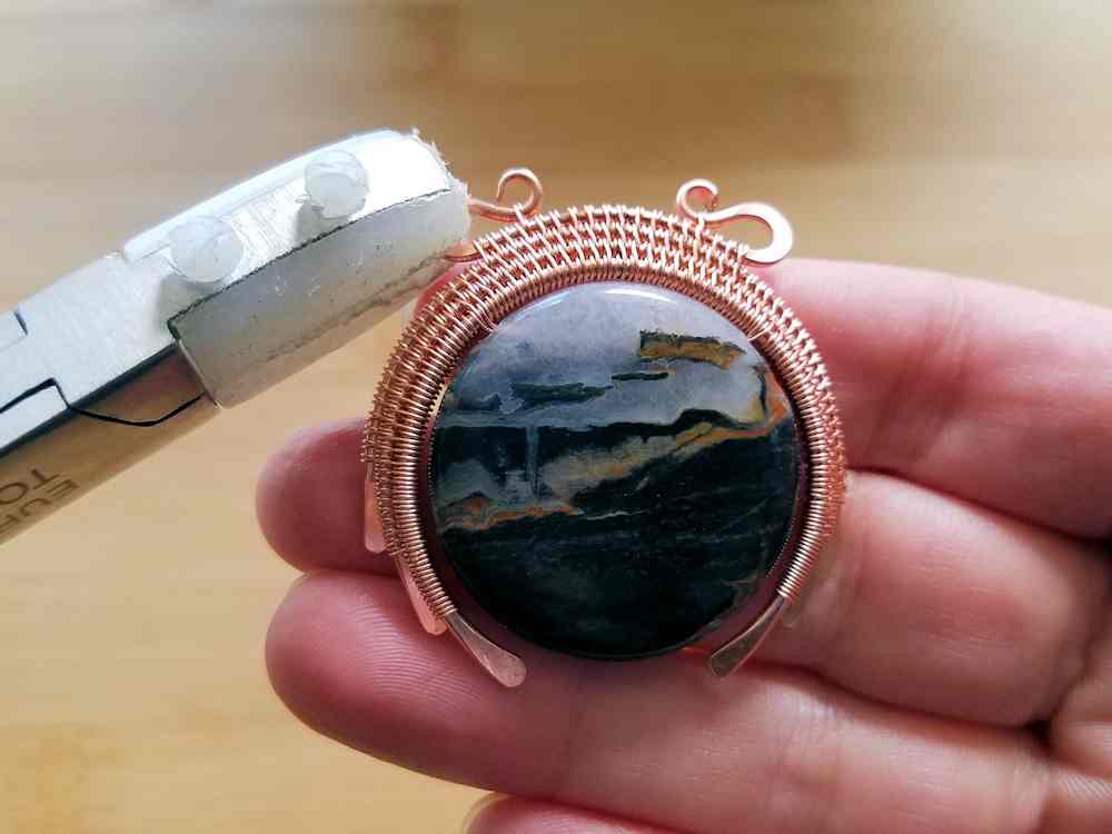 Step 21 - Sculpt the bead frame into a convex shape and position the loops on the bail wire.