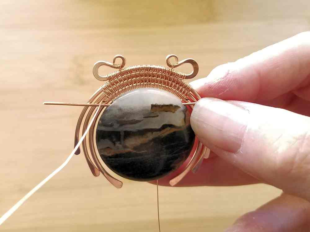 Step 16 - Recheck the hole position using the bead and a piece of scrap wire. Make any necessary adjustments on your weave before proceeding to the next step. 