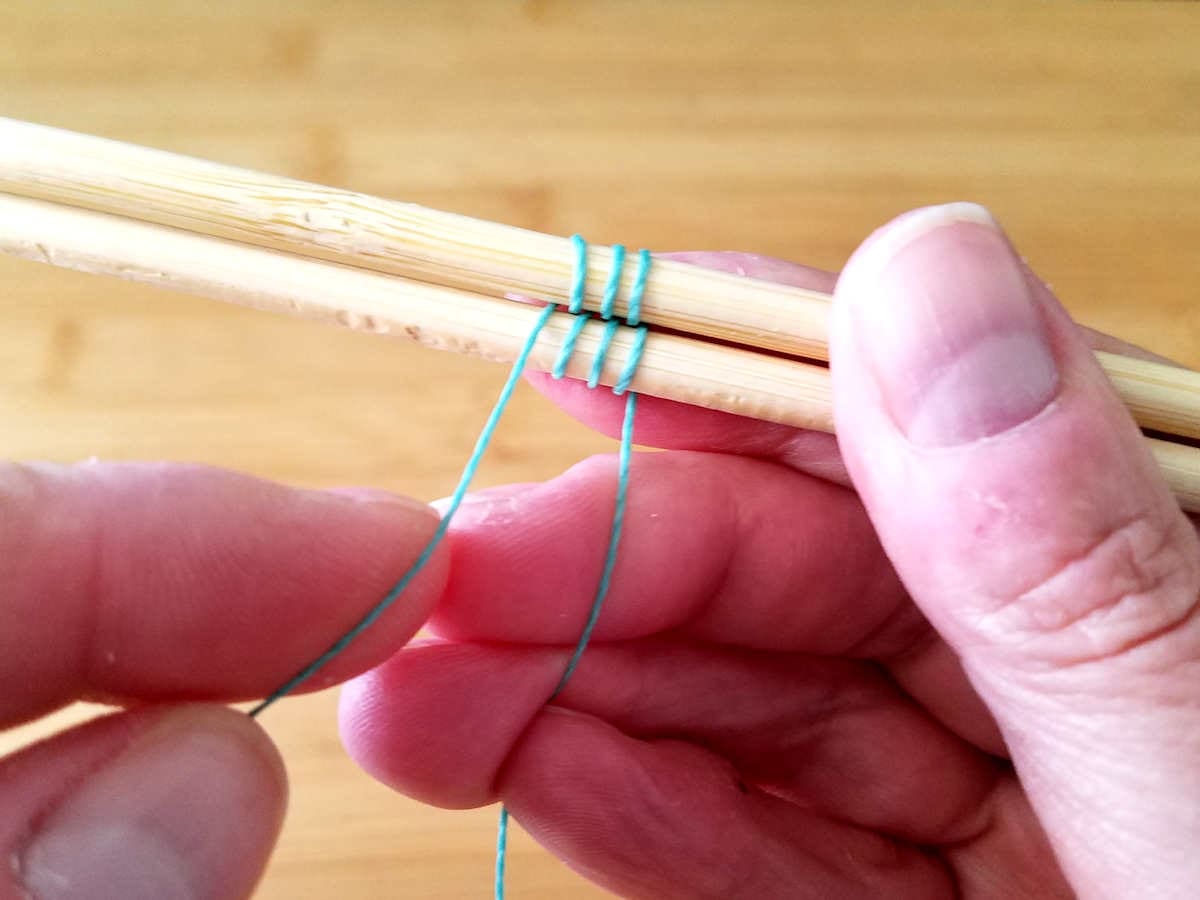 In this image, I've completed three full pattern repeats, which is indicated by the fact that there are three complete wraps on each of the two core wires. 