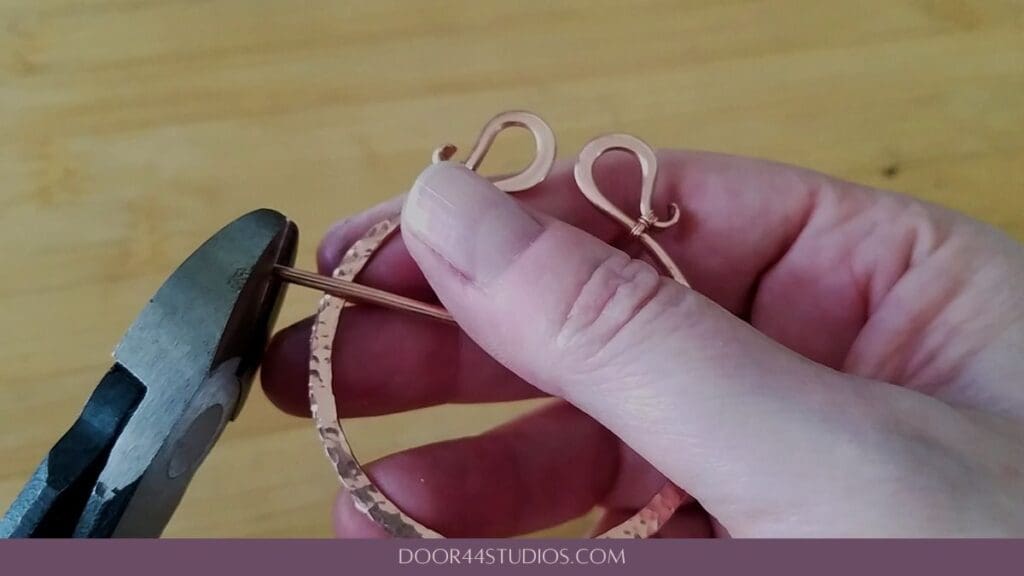 Trimming the stick pin to size with heavy duty wire cutters