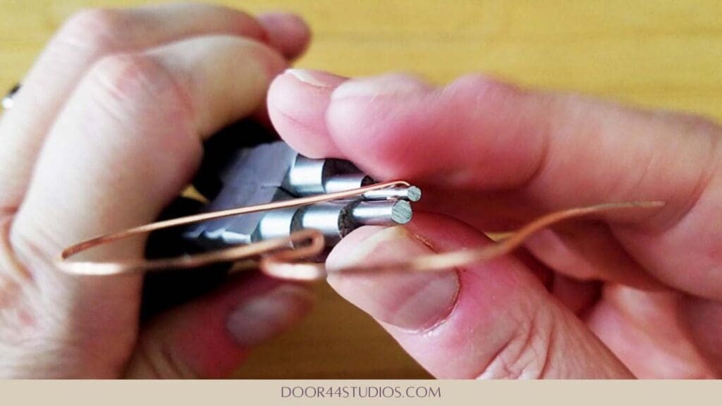 Finish forming the hook that will secure the ear wire
