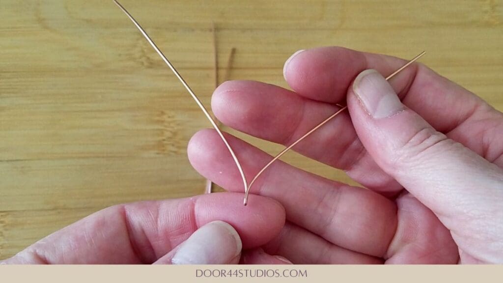 An image of the first wire after the ends are spread outward